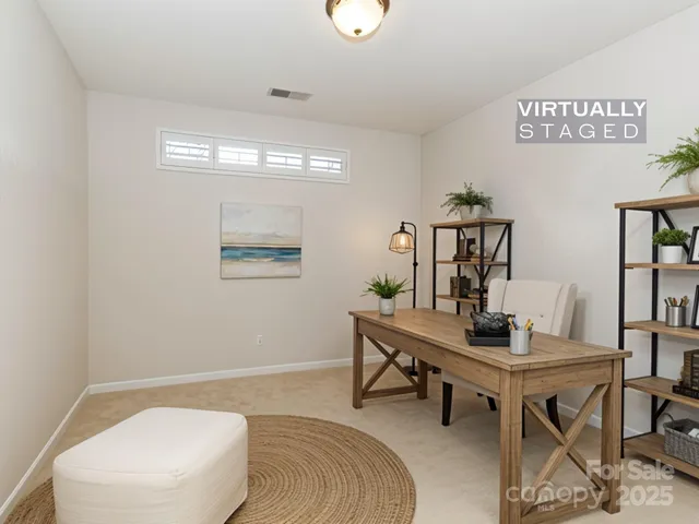 a view of a patio with table and chairs and potted plants