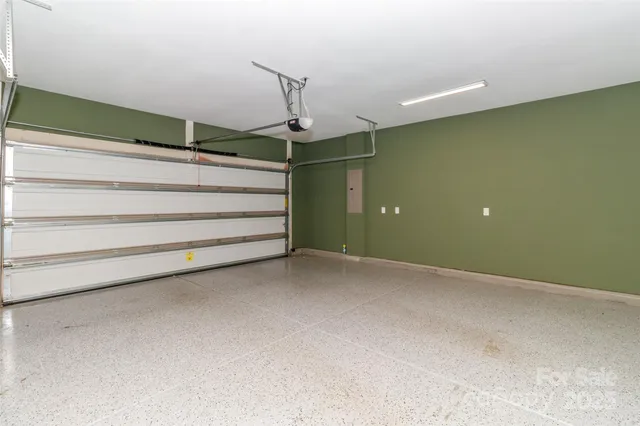 a view of a backyard with a patio and plants