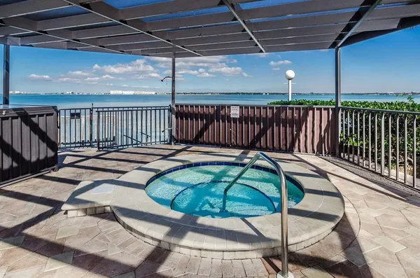 a view of a chairs and table in the patio
