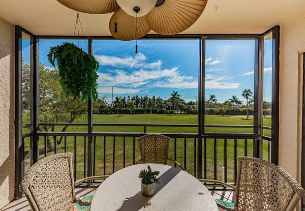 a ocean view with a seating space and hardwood floor