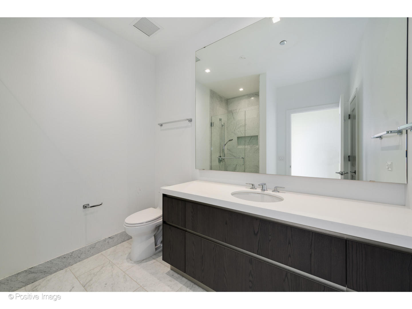 363 East Wacker Drive, Unit 1903 Chicago, IL 60601 - Photo 24 of 39 a bathroom with a sink and a mirror