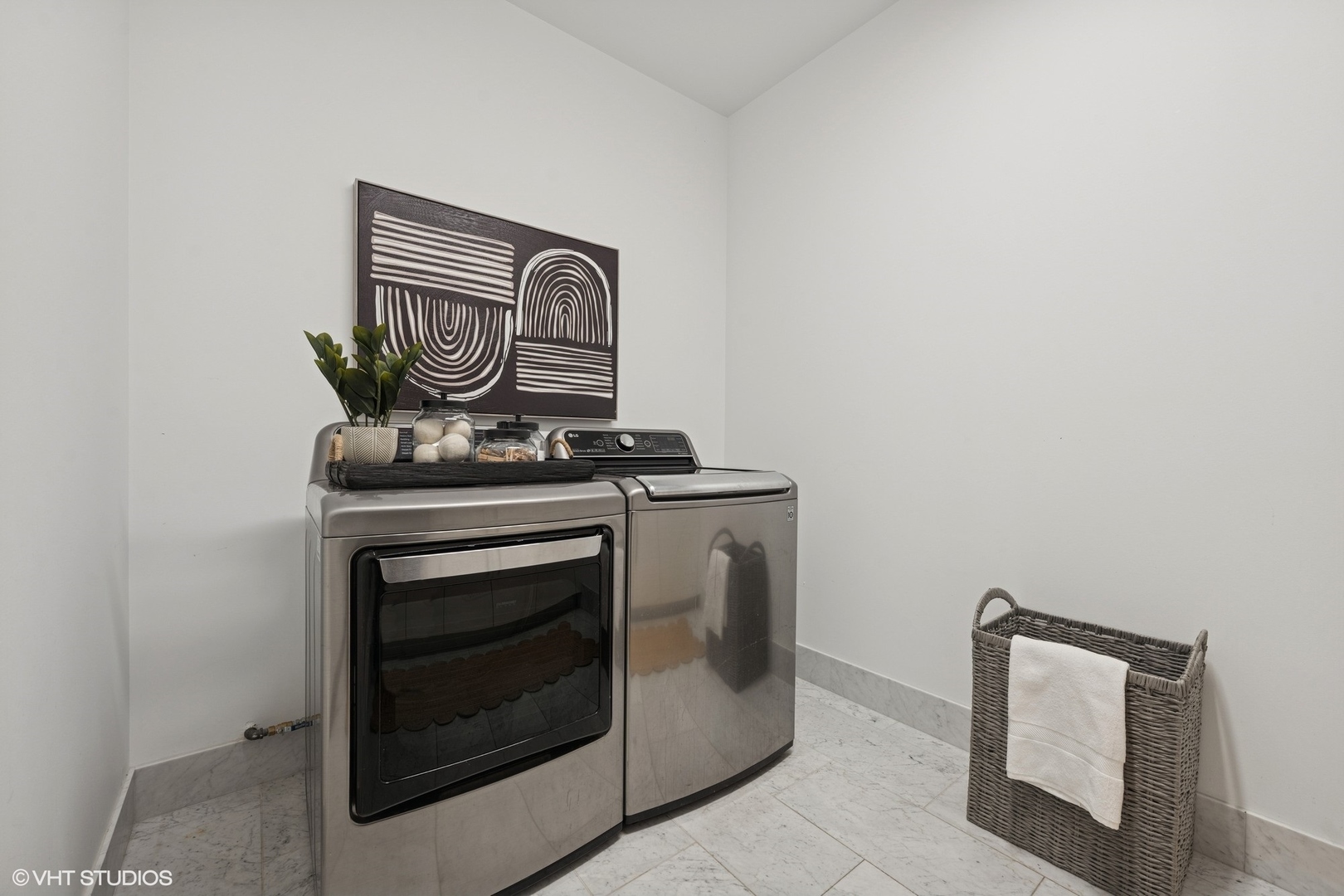 363 East Wacker Drive, Unit 1903 Chicago, IL 60601 - Photo 26 of 39 a stove top oven sitting inside of a kitchen