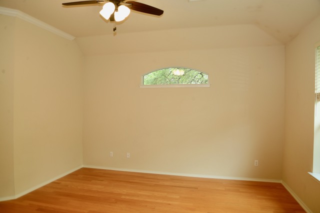 138 Chestnut Court Georgetown, TX 78633 - Photo 13 of 25 Hardwood floors and vaulted ceilings create a luminous living area.