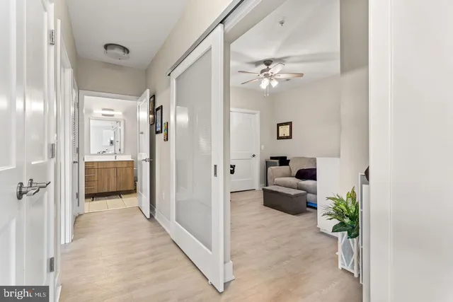 a view of a hallway view with living space and living room view
