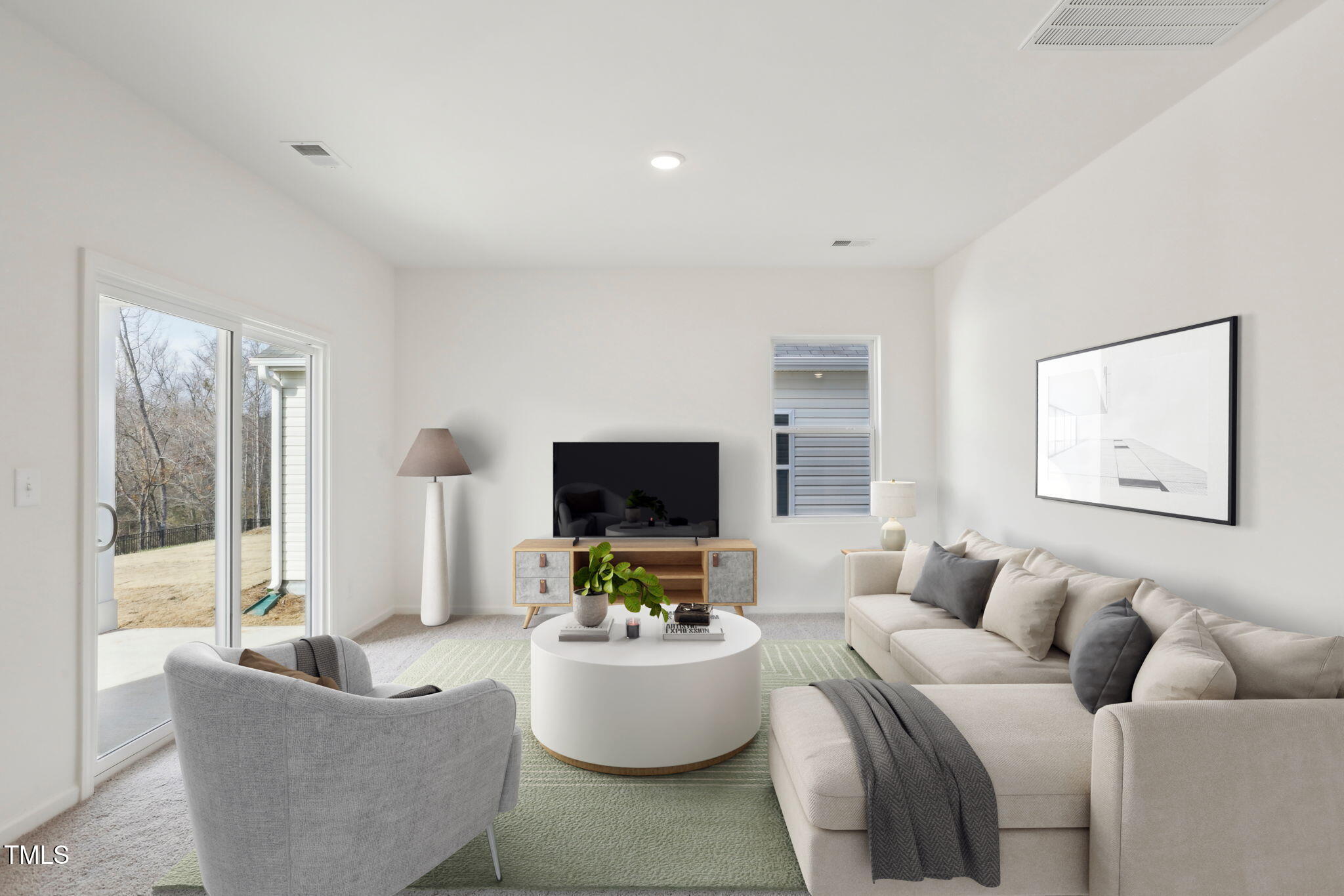 927 Embraer Way Spring Hope, NC 27882 - Photo 22 of 43 a living room with furniture and a flat screen tv