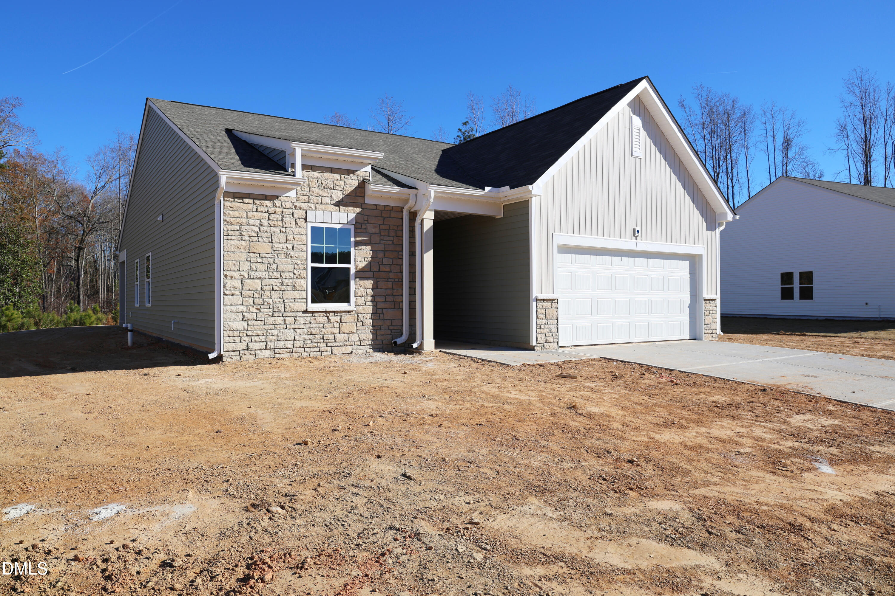 927 Embraer Way Spring Hope, NC 27882 - Photo 4 of 43 a view of a house with wooden fence