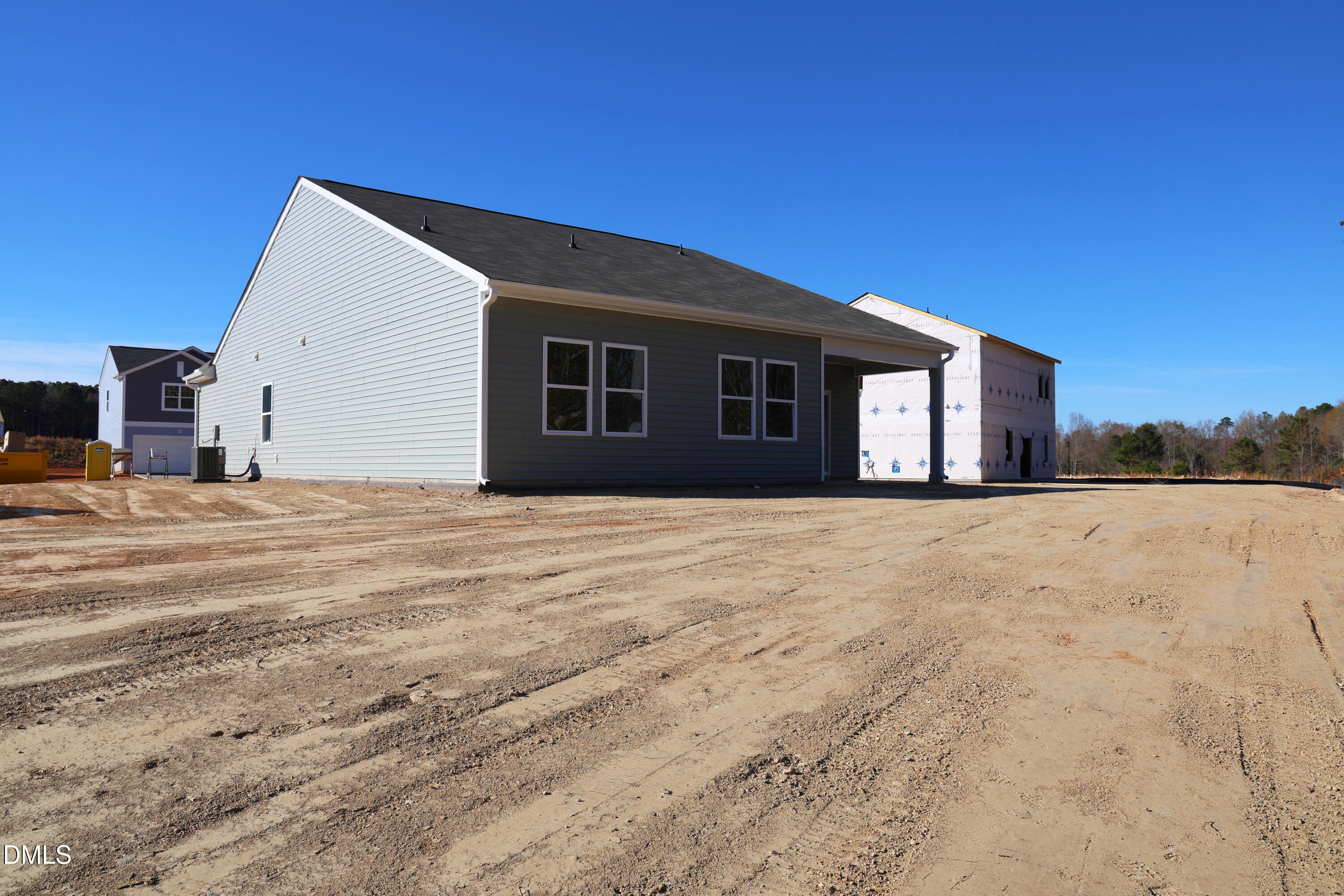 927 Embraer Way Spring Hope, NC 27882 - Photo 6 of 43 a view of a house with a yard