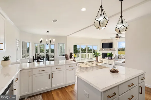 a kitchen that has a lot of cabinets in it