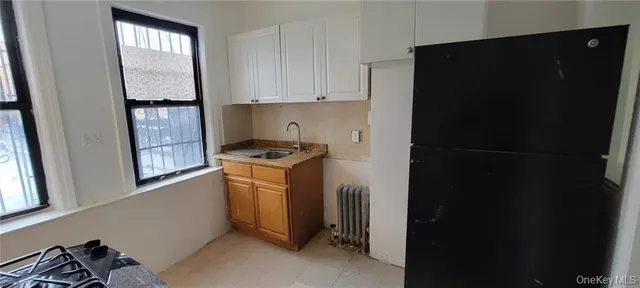 a utility room with closet dryer and washer