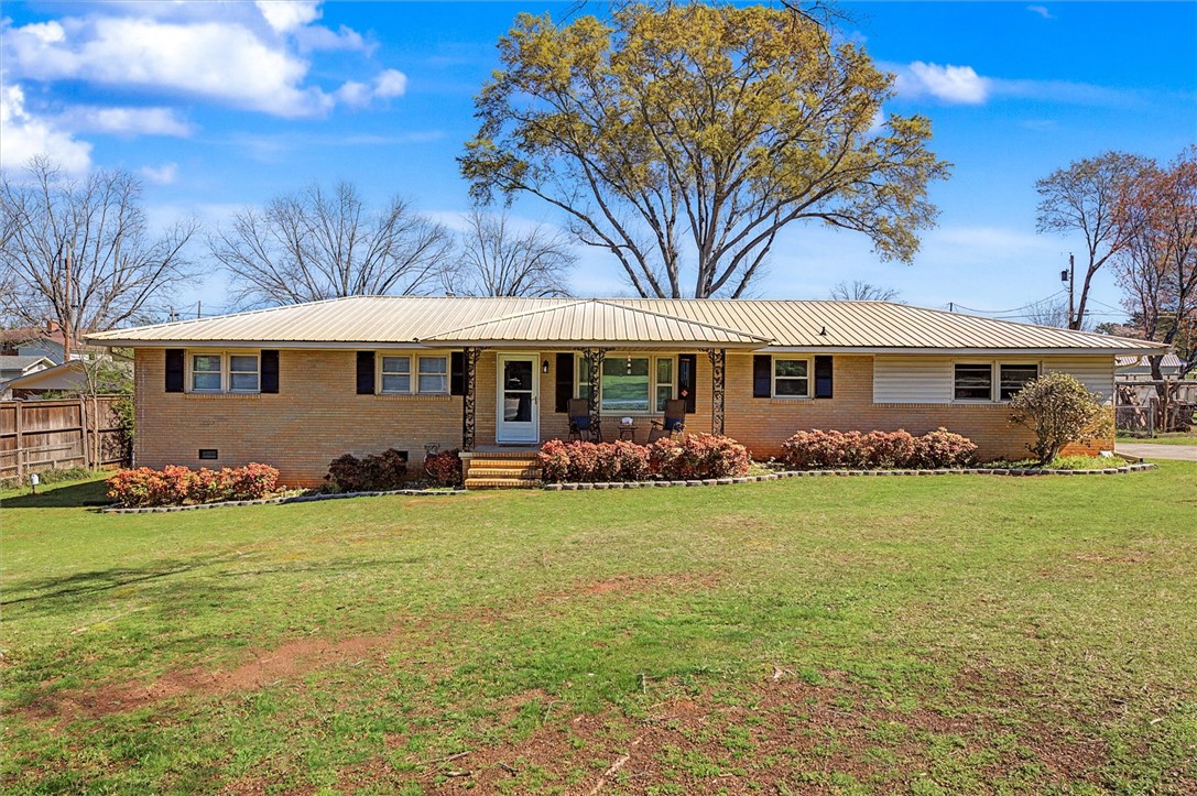 305 Clearview Drive Anderson, SC 29625 - Photo 1 of 35 This charming brick ranch features a great yard and a welcoming front porch.