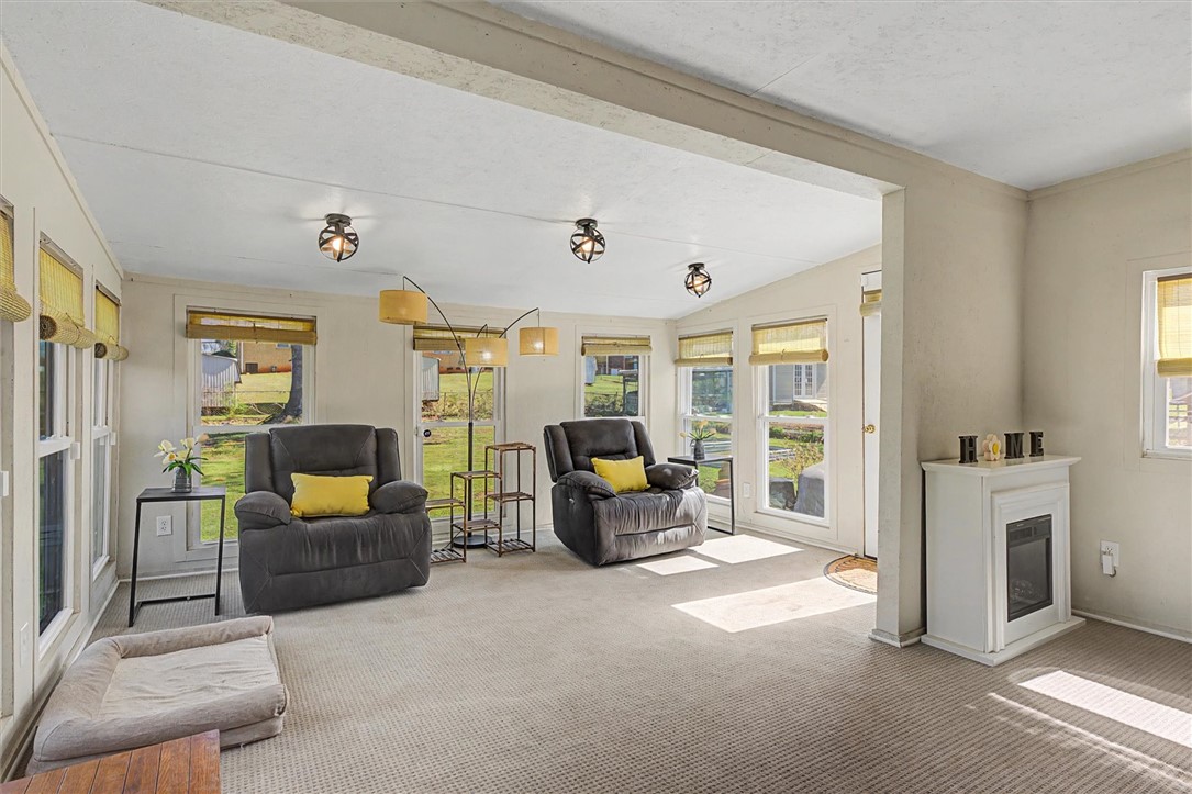 305 Clearview Drive Anderson, SC 29625 - Photo 23 of 35 This bright sunroom offers a great spot for a morning cup of coffee or a cozy place to unwind in the evening.
