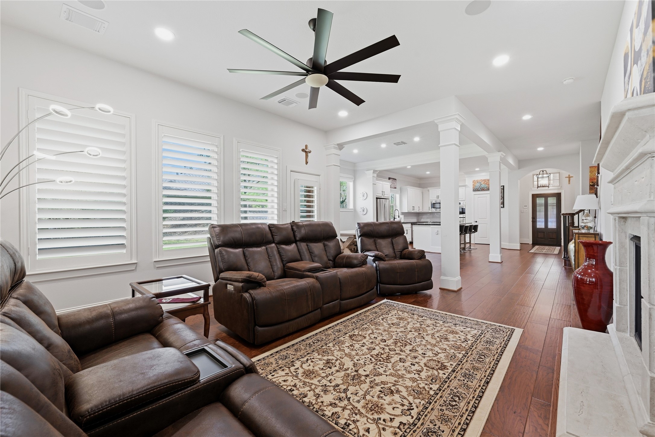 7 Sleeping Colt Place Spring, TX 77389 - Photo 17 of 32 Inviting living room flow into the heart of the home.