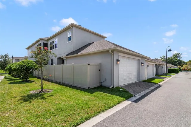 a front view of house with garden