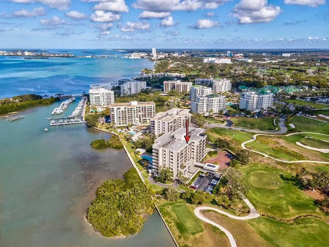 a view of a swimming pool with a lounge chairs