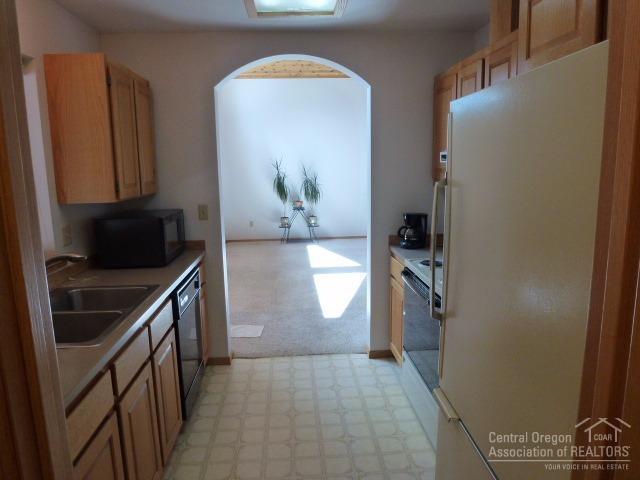 64825 McGrath Road Bend, OR 97701 - Photo 13 of 25 View from kitchen into family room