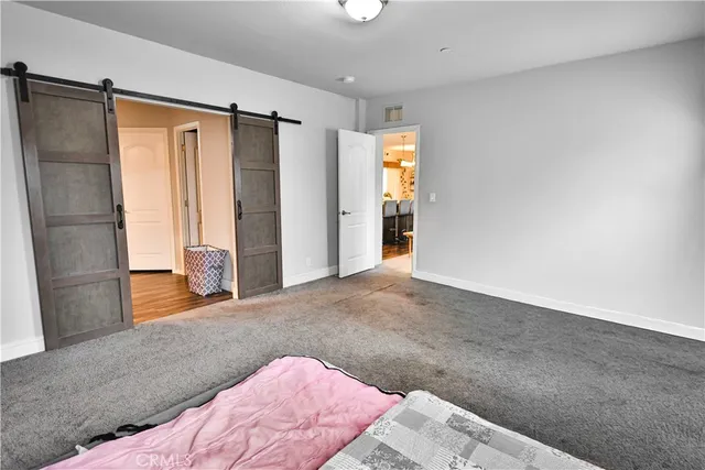 a view of livingroom with hardwood floor and hallway