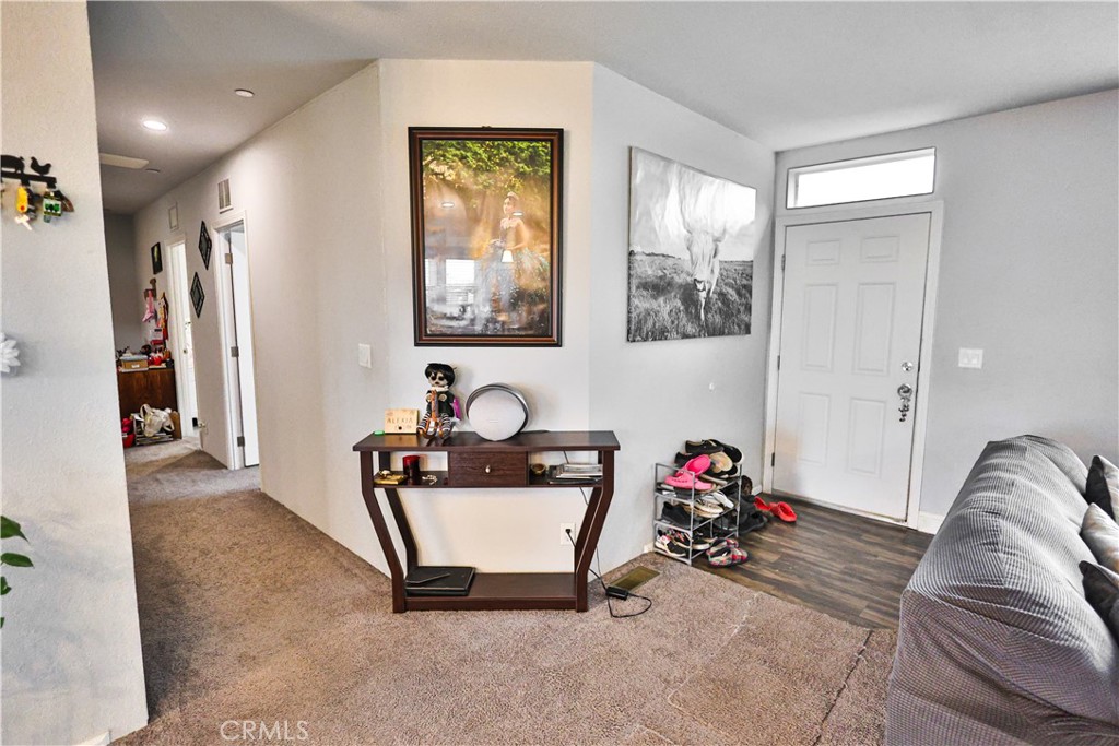 4210 Osborn Road Flournoy, CA 96021 - Photo 30 of 50 a living room with furniture and a potted plant