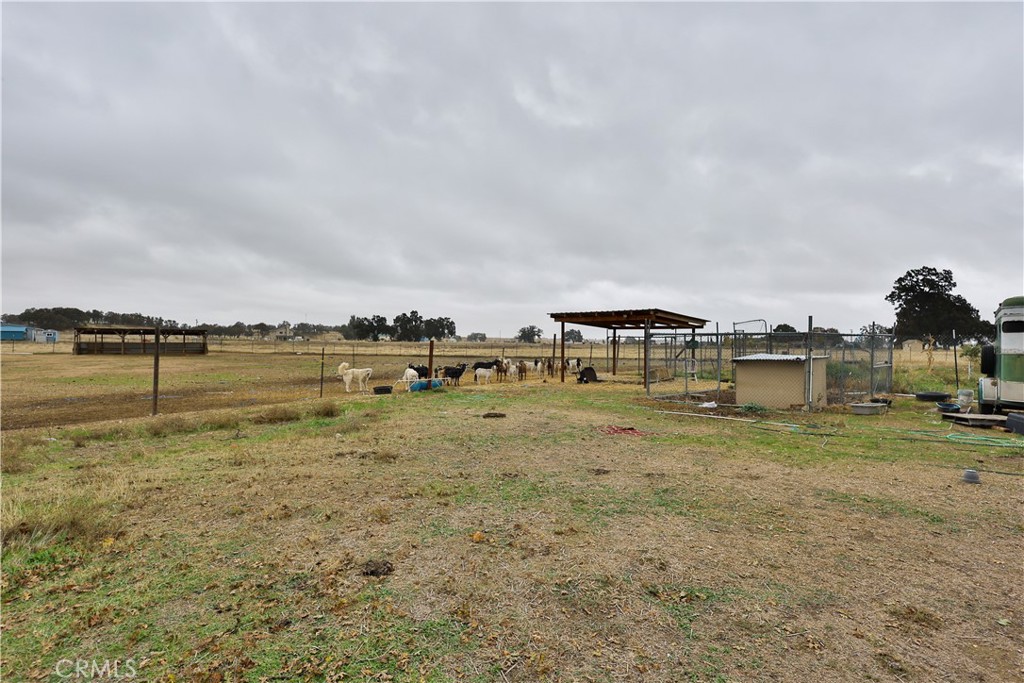 4210 Osborn Road Flournoy, CA 96021 - Photo 45 of 50 a view of a lake with houses in background