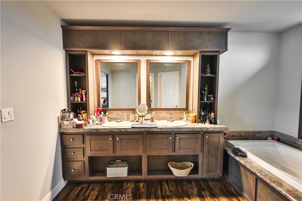 4210 Osborn Road Flournoy, CA 96021 - Photo 9 of 50 a bathroom with a sink and a mirror