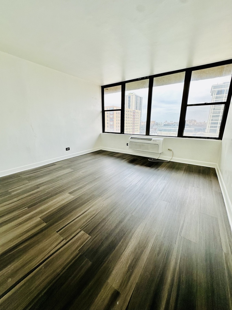 345 East Eastgate Place, Unit 602 Chicago, IL 60616 - Photo 11 of 13 a view of a hardwood floor