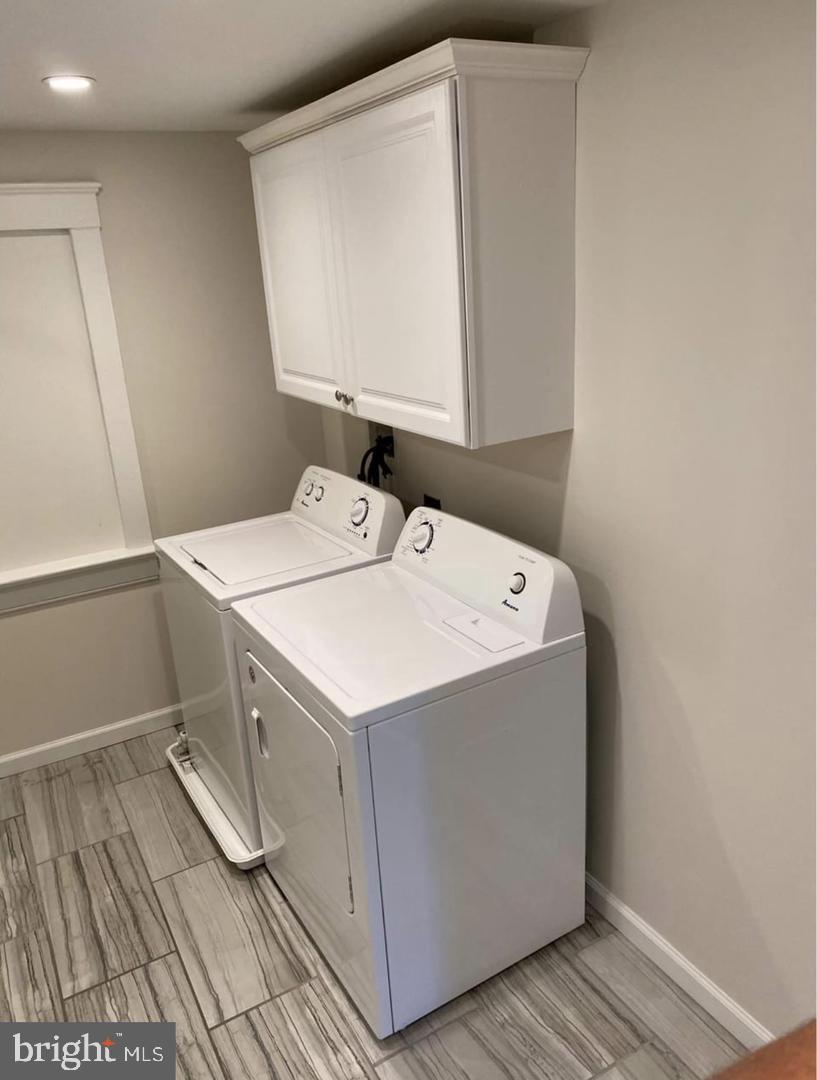 20 Reese Avenue, Unit 2 Newtown Square, PA 19073 - Photo 7 of 7 a utility room with washer and dryer