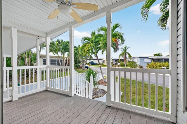 a view of balcony with furniture