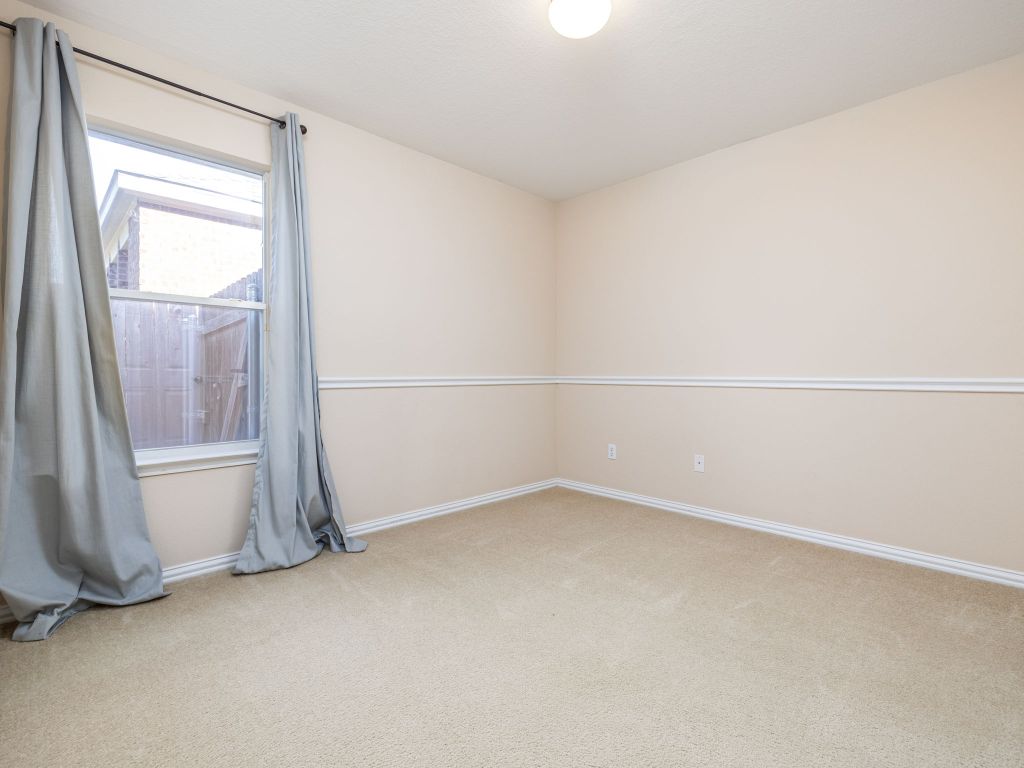 2005 Granite Springs Road Leander, TX 78641 - Photo 19 of 30 a view of an empty room and a window