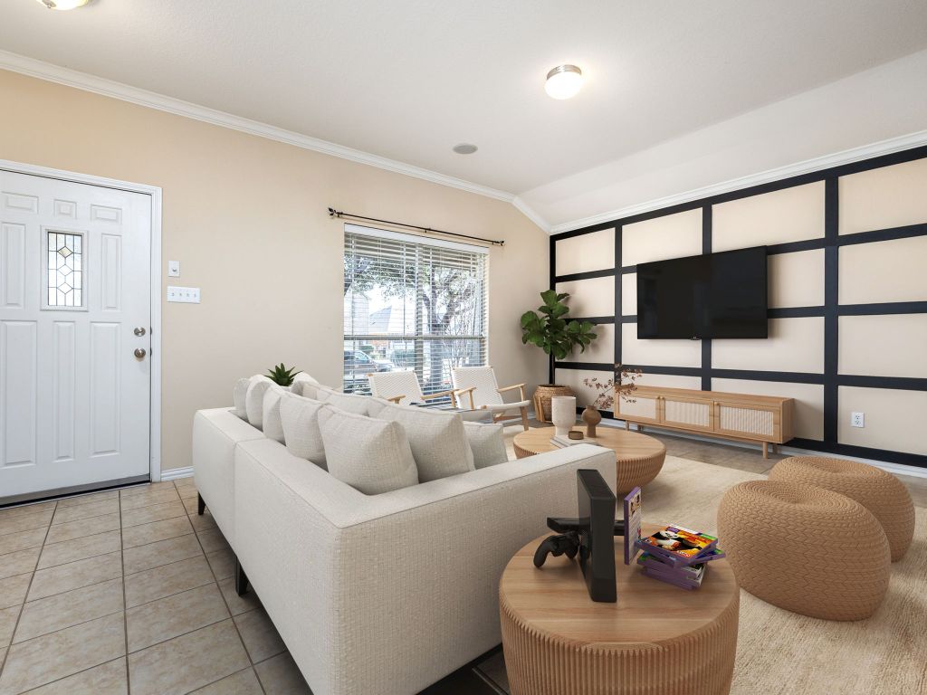 2005 Granite Springs Road Leander, TX 78641 - Photo 2 of 30 a living room with furniture and a flat screen tv