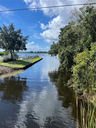a view of a lake from a yard