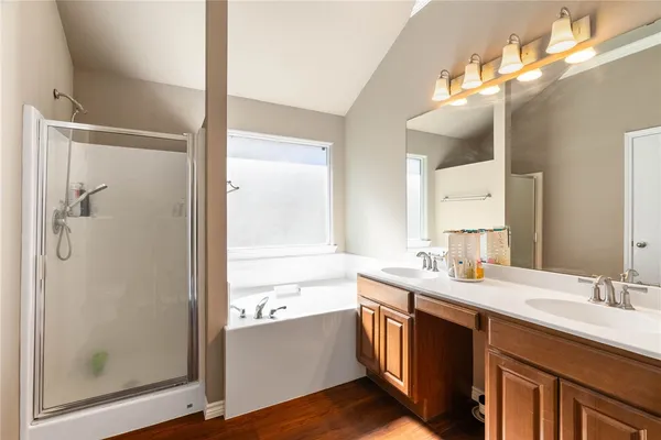a bathroom with a double vanity sink mirror and double