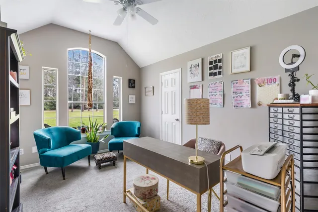 a living room with furniture and a window