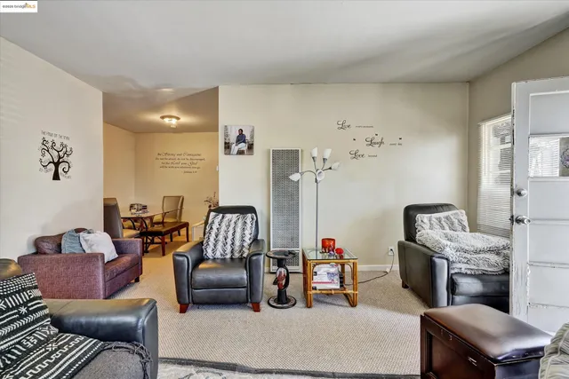 a bedroom with furniture and a chandelier