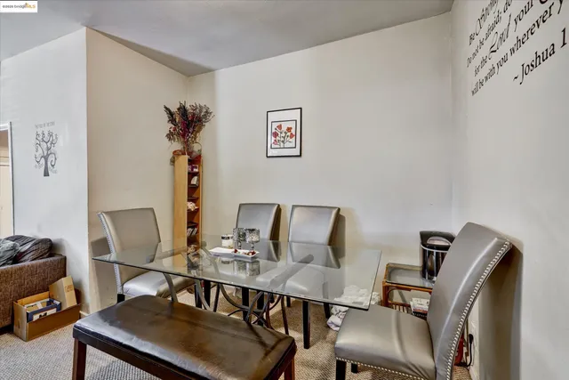 a view of a workspace with furniture