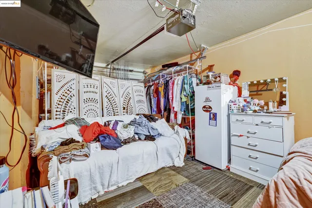 a bed room with a bed and a bed