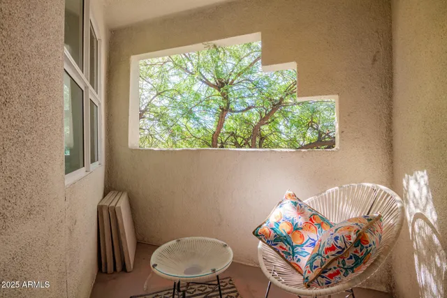 a view of entryway and hall with a front door