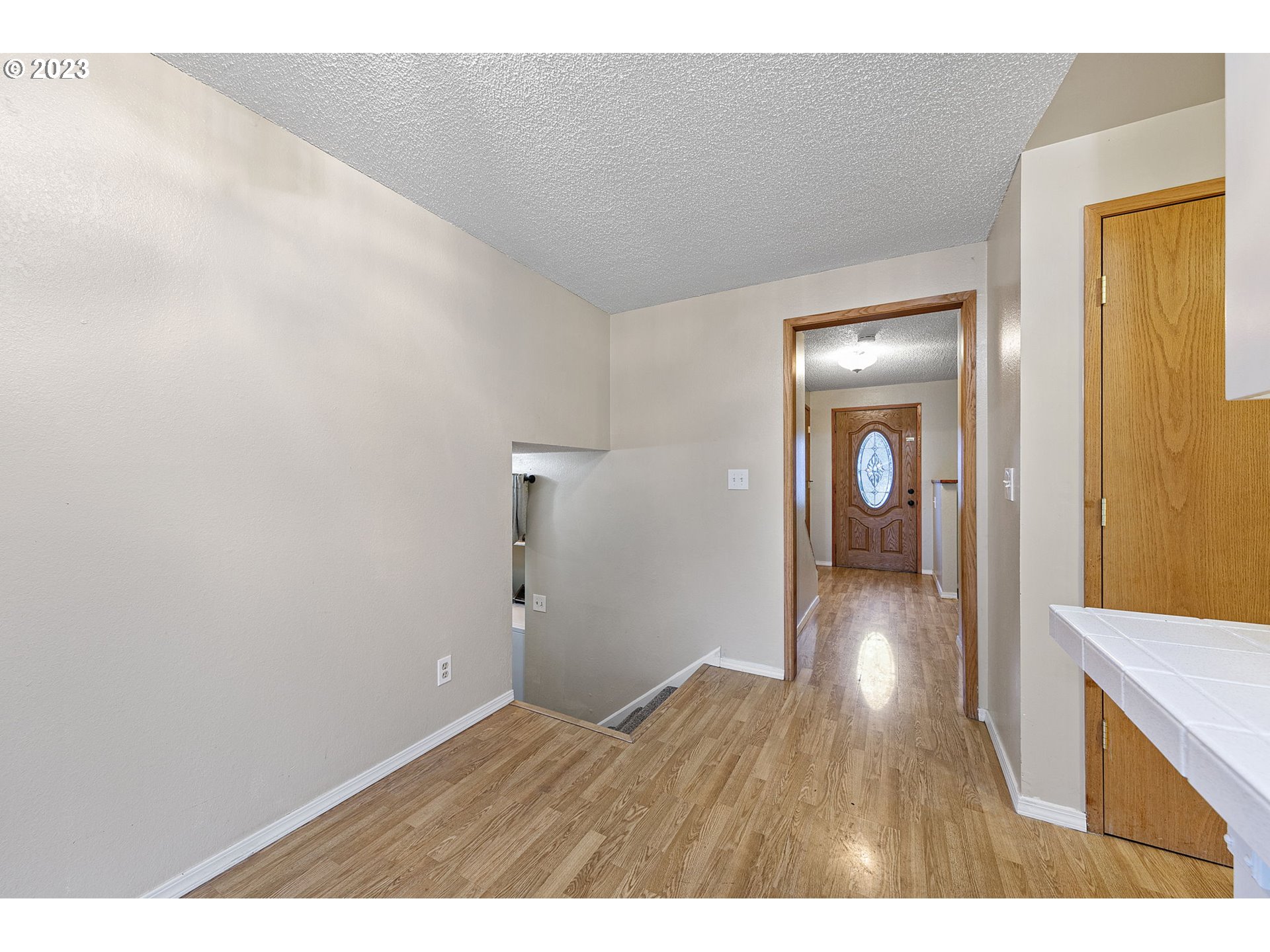 788 70th Street Springfield, OR 97478 - Photo 14 of 39 a view of a hallway with wooden floor