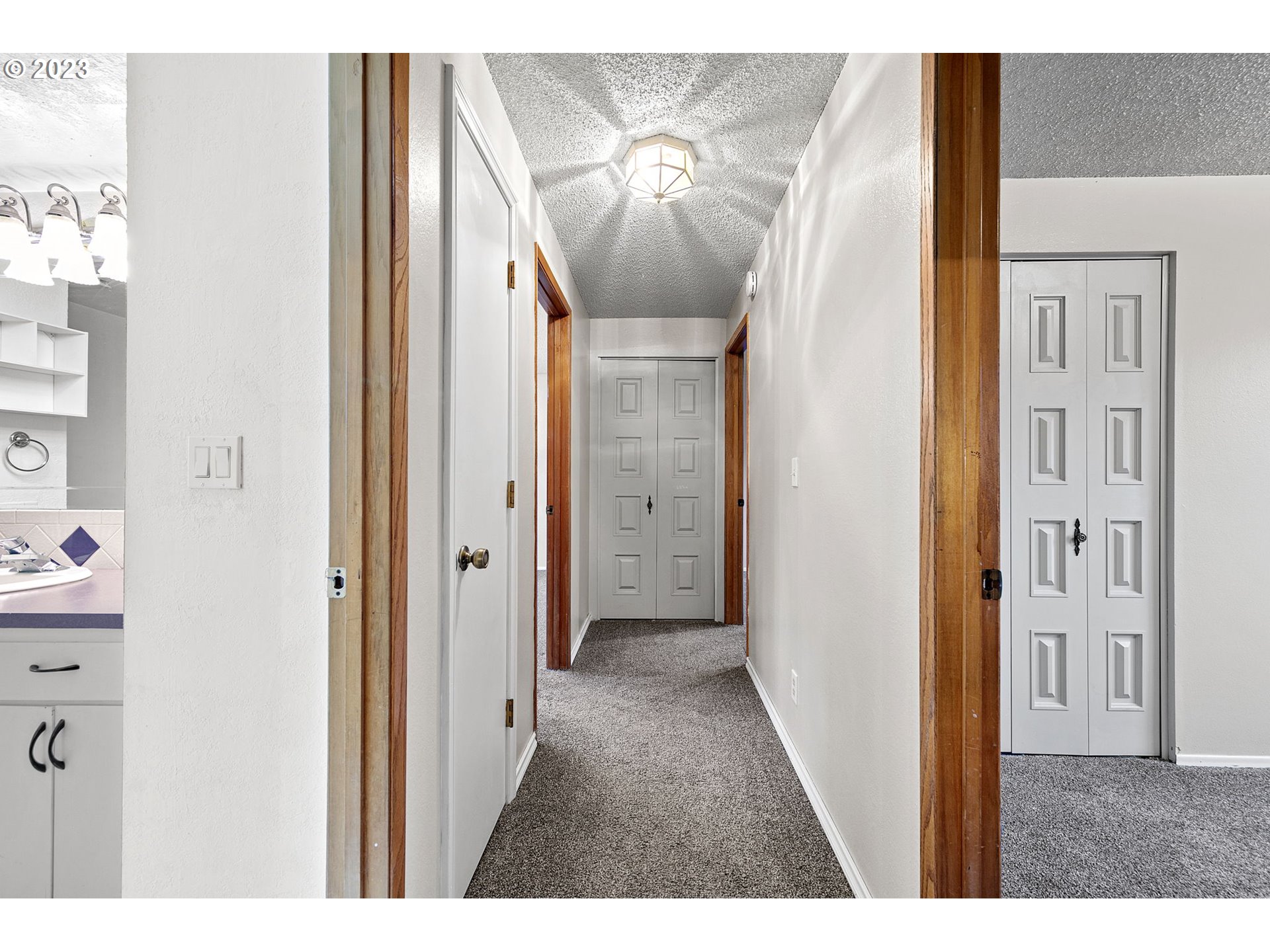 788 70th Street Springfield, OR 97478 - Photo 20 of 39 a view of a hallway with a elevator