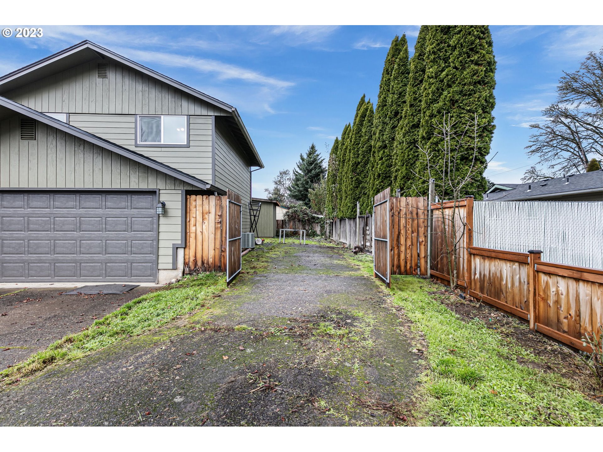 788 70th Street Springfield, OR 97478 - Photo 2 of 39 a view of a house with wooden fence