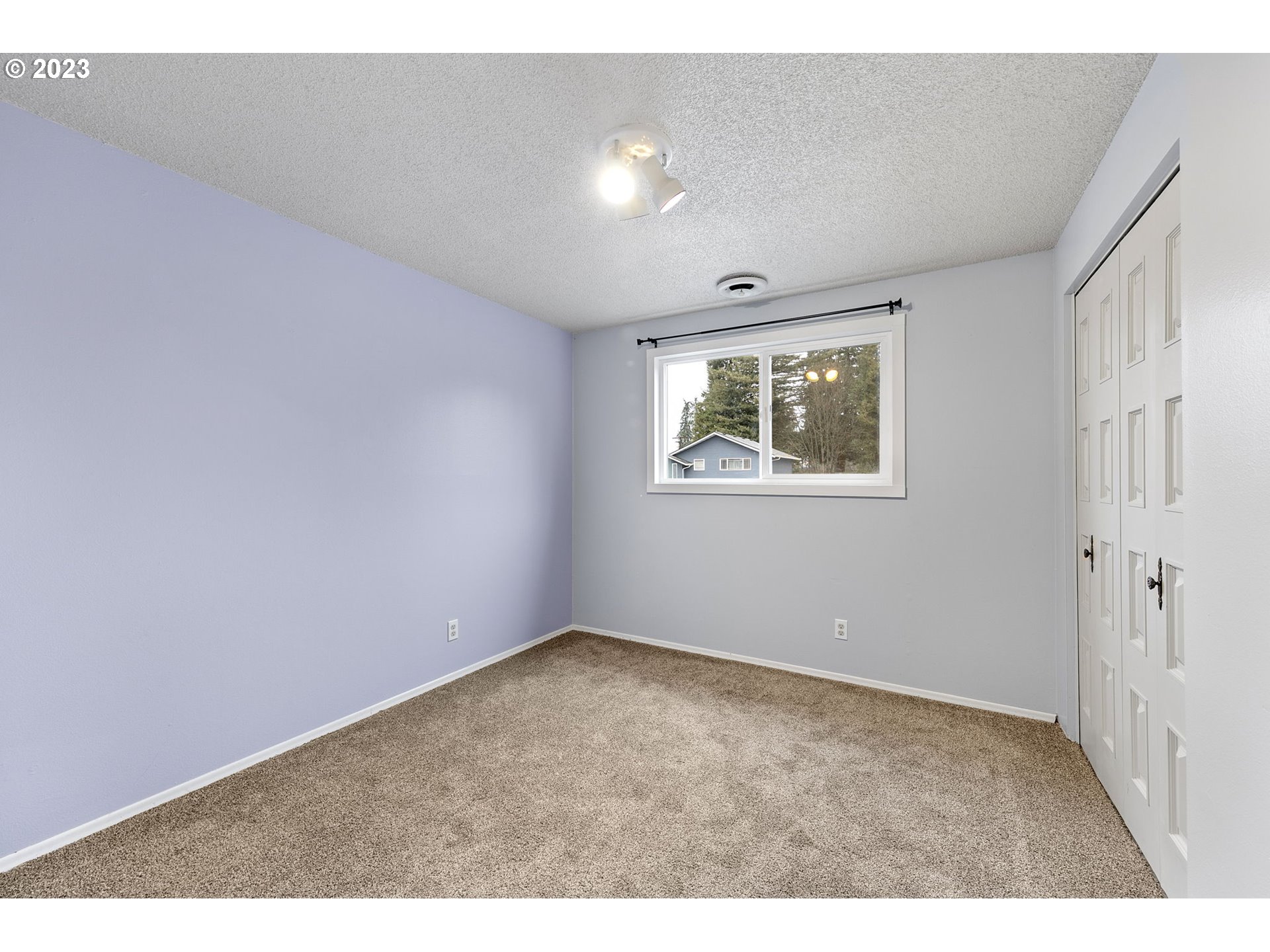 788 70th Street Springfield, OR 97478 - Photo 22 of 39 a view of an empty room with a window