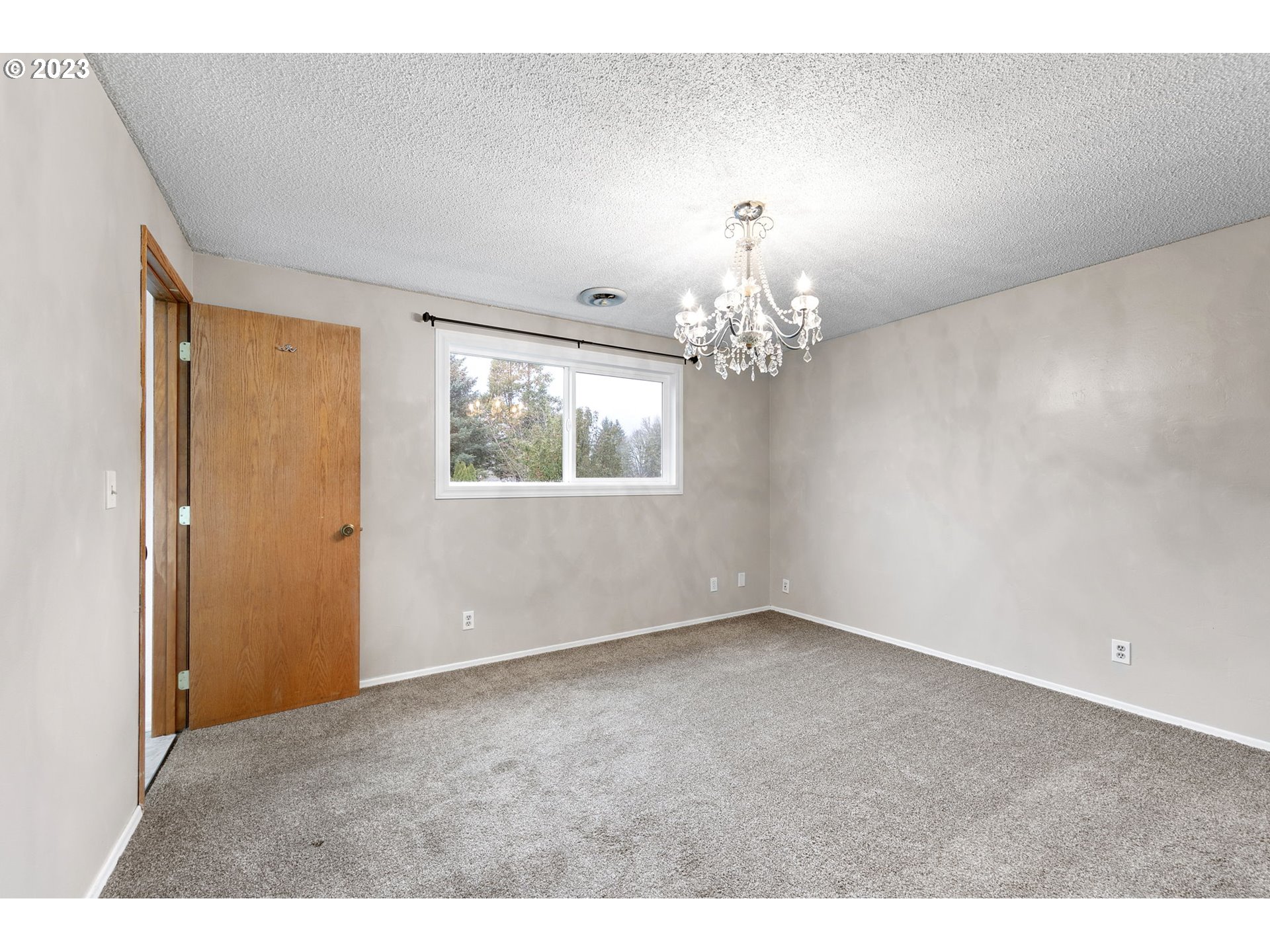 788 70th Street Springfield, OR 97478 - Photo 27 of 39 a view of an empty room with a window
