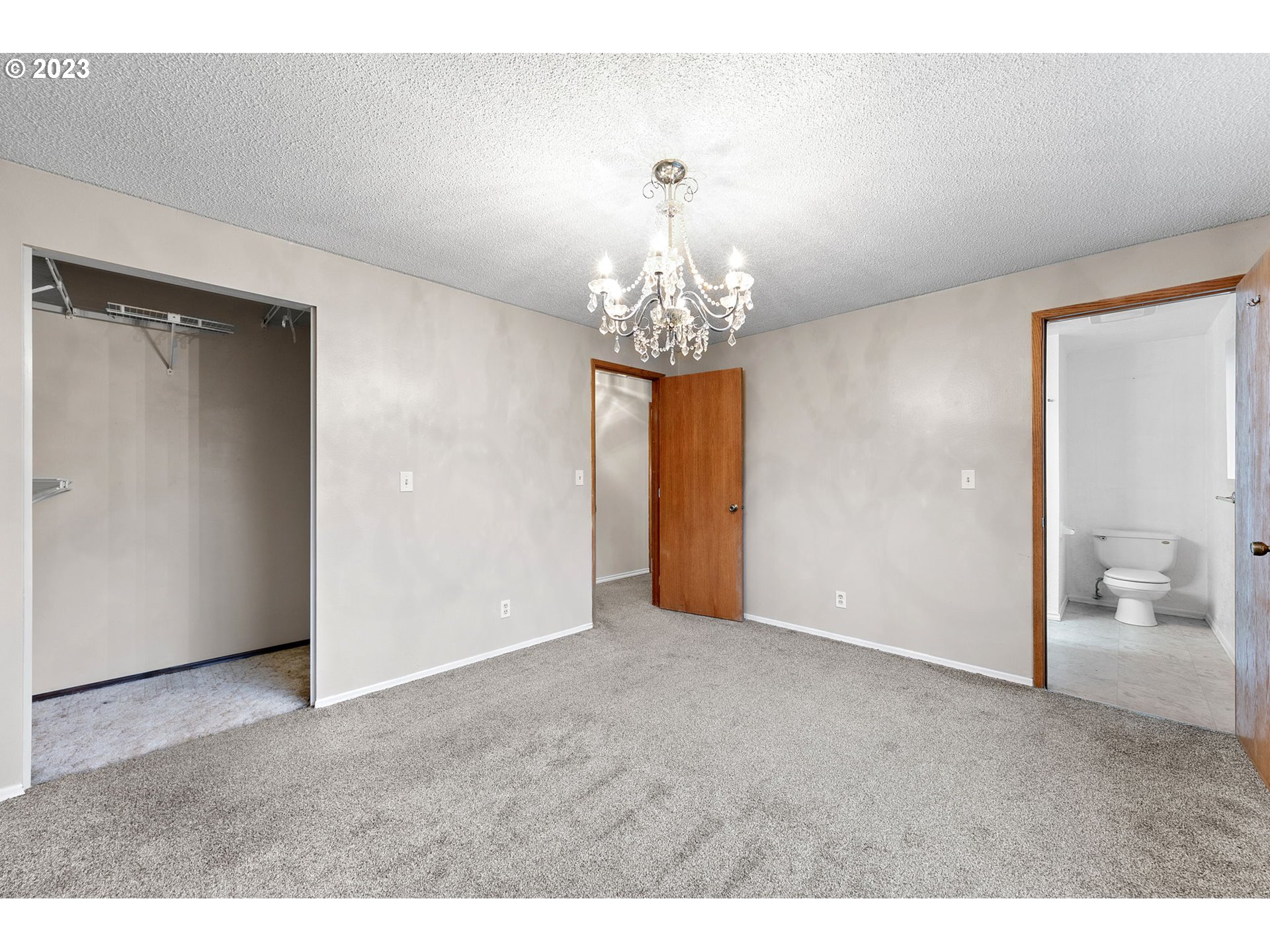 788 70th Street Springfield, OR 97478 - Photo 28 of 39 a view of an empty room and a chandelier