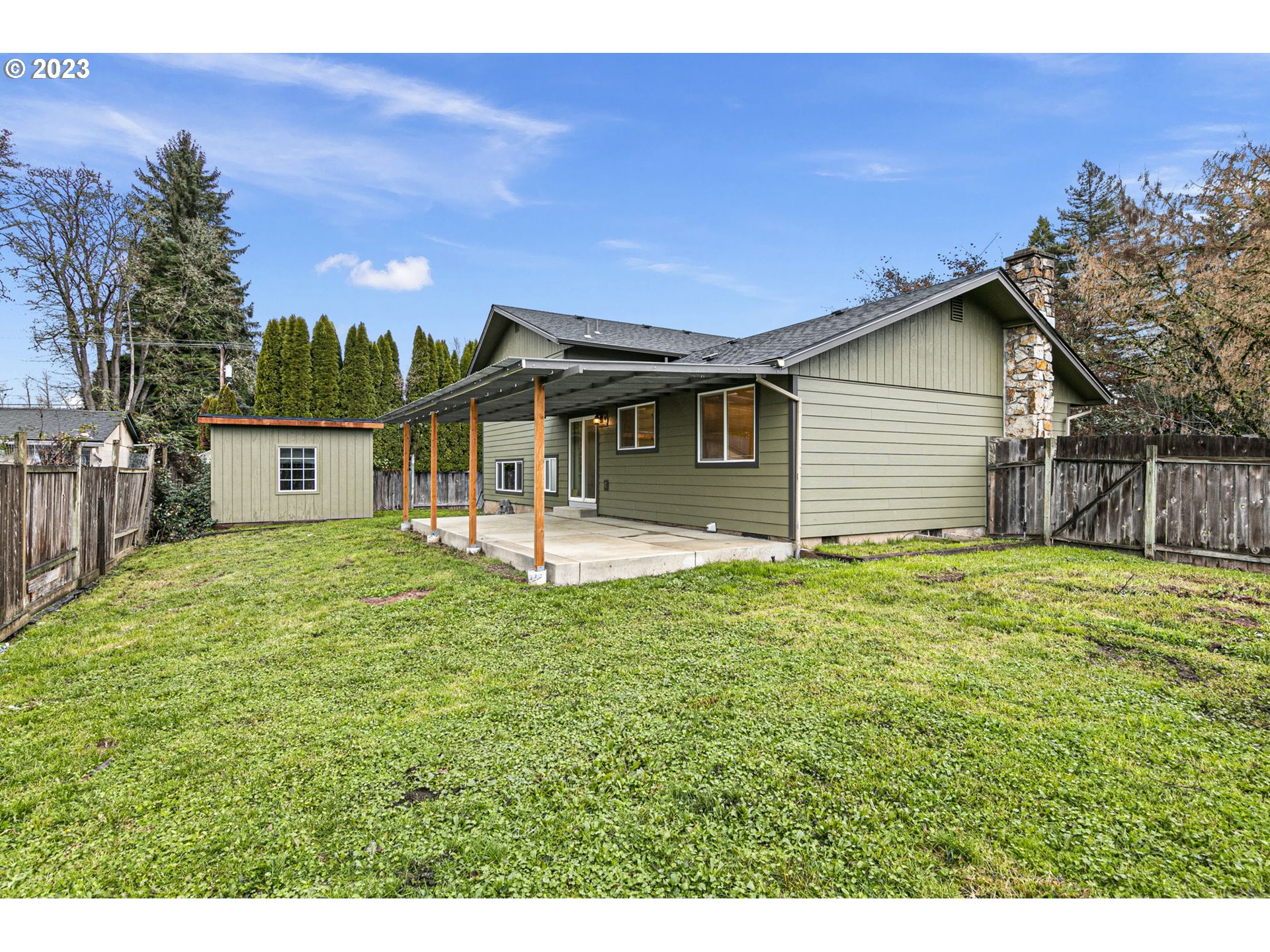 788 70th Street Springfield, OR 97478 - Photo 35 of 39 a backyard of a house with table and chairs