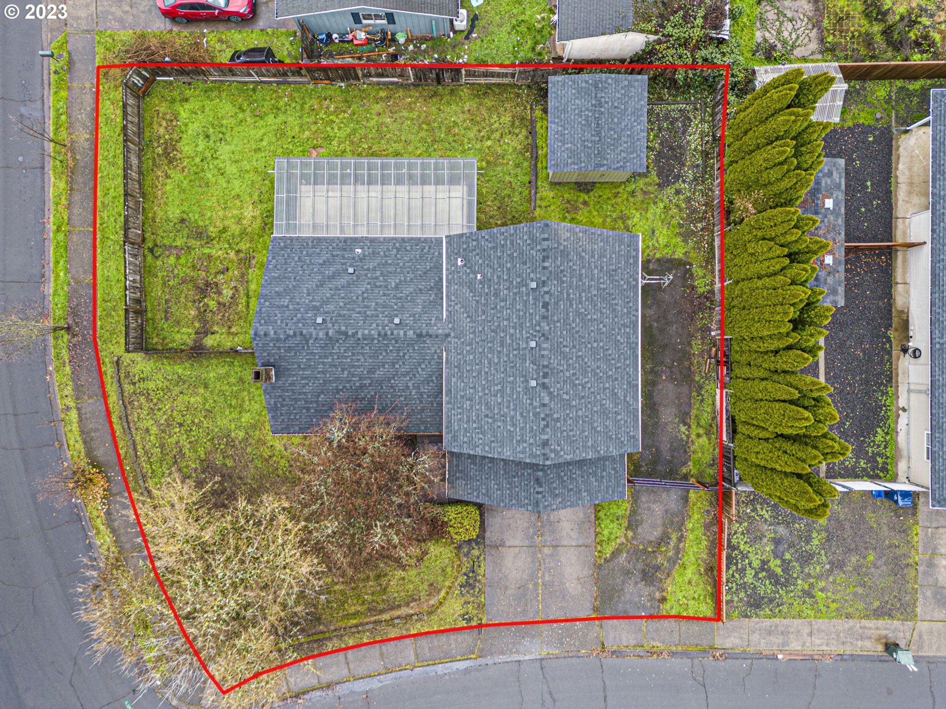 788 70th Street Springfield, OR 97478 - Photo 38 of 39 aerial view of a house with a yard and a large tree