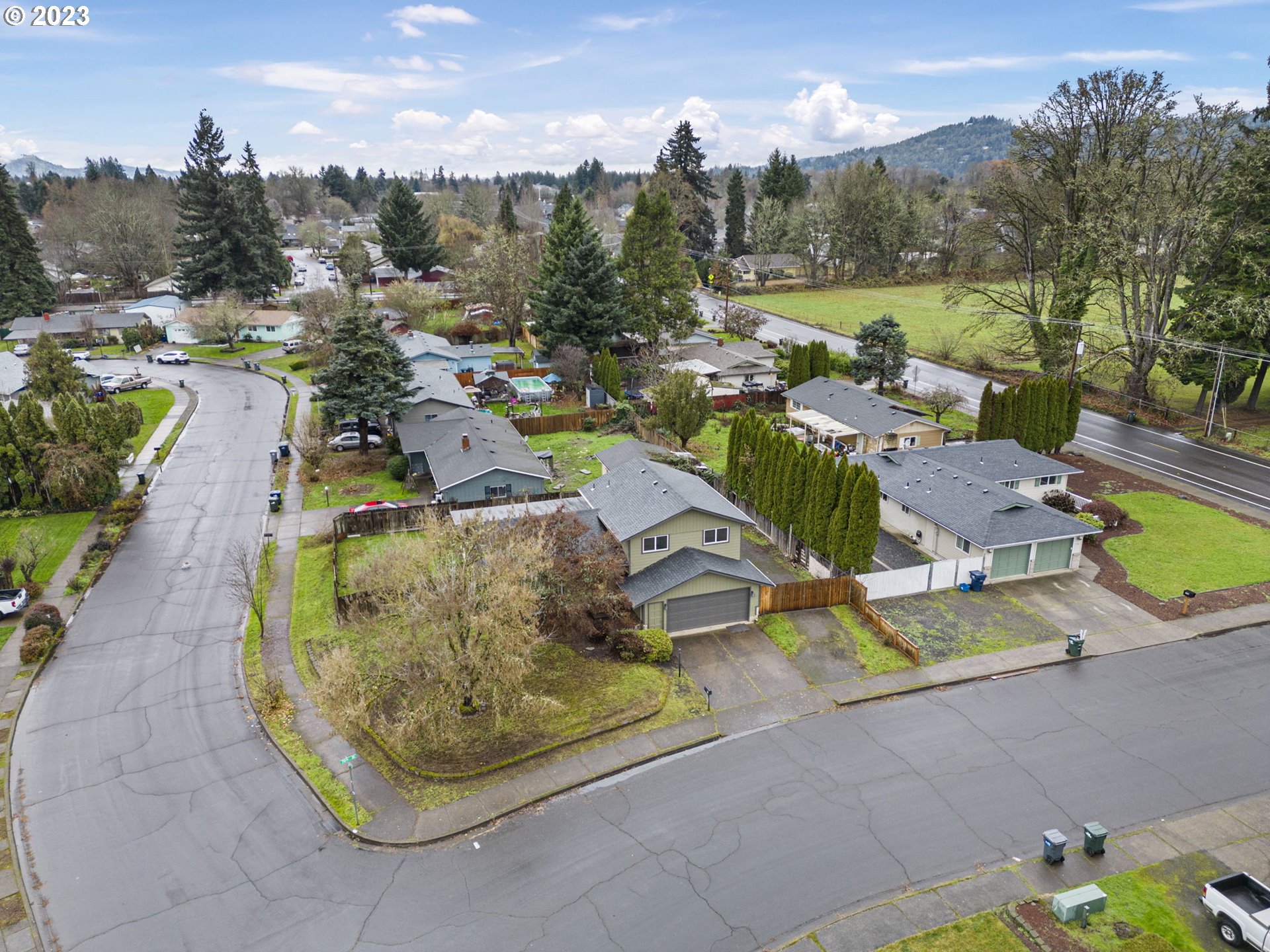 788 70th Street Springfield, OR 97478 - Photo 39 of 39 a view of a swimming pool with a patio and a yard