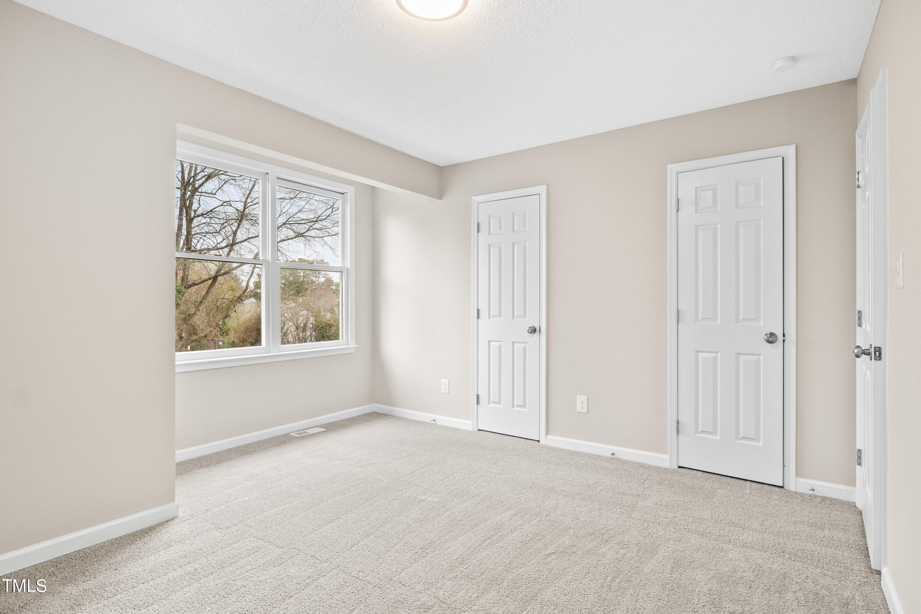 4440 Roller Court Raleigh, NC 27604 - Photo 22 of 38 a view of an empty room with a window