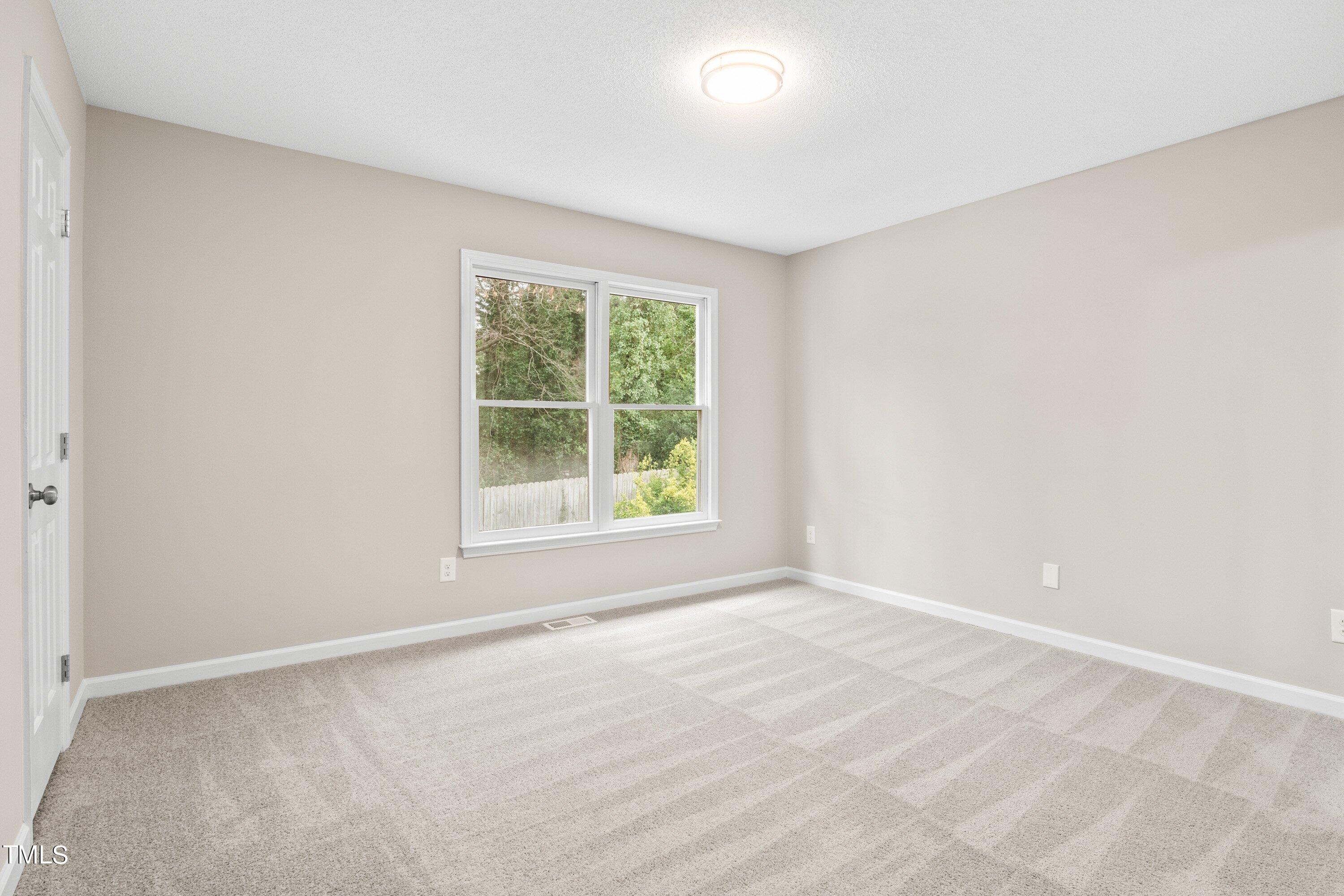 4440 Roller Court Raleigh, NC 27604 - Photo 26 of 38 an empty room with window