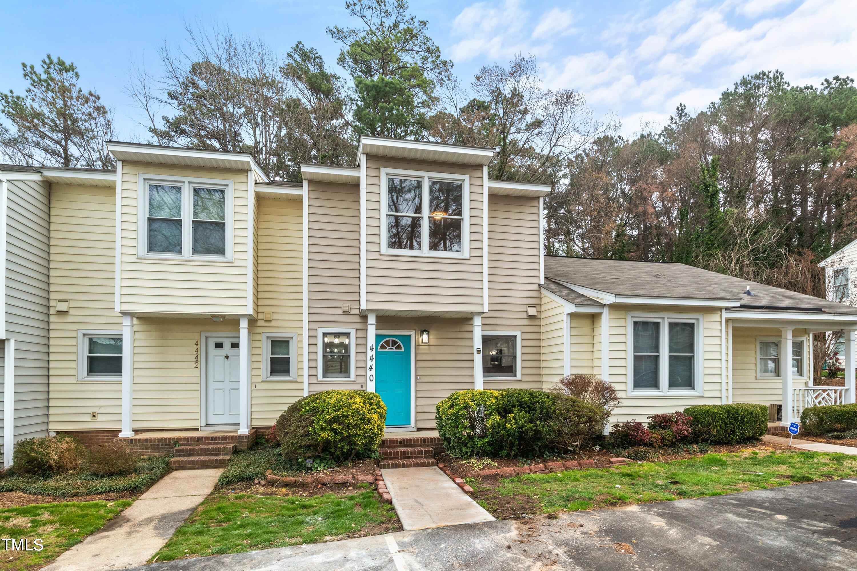 4440 Roller Court Raleigh, NC 27604 - Photo 3 of 38 front view of a house that has a yard