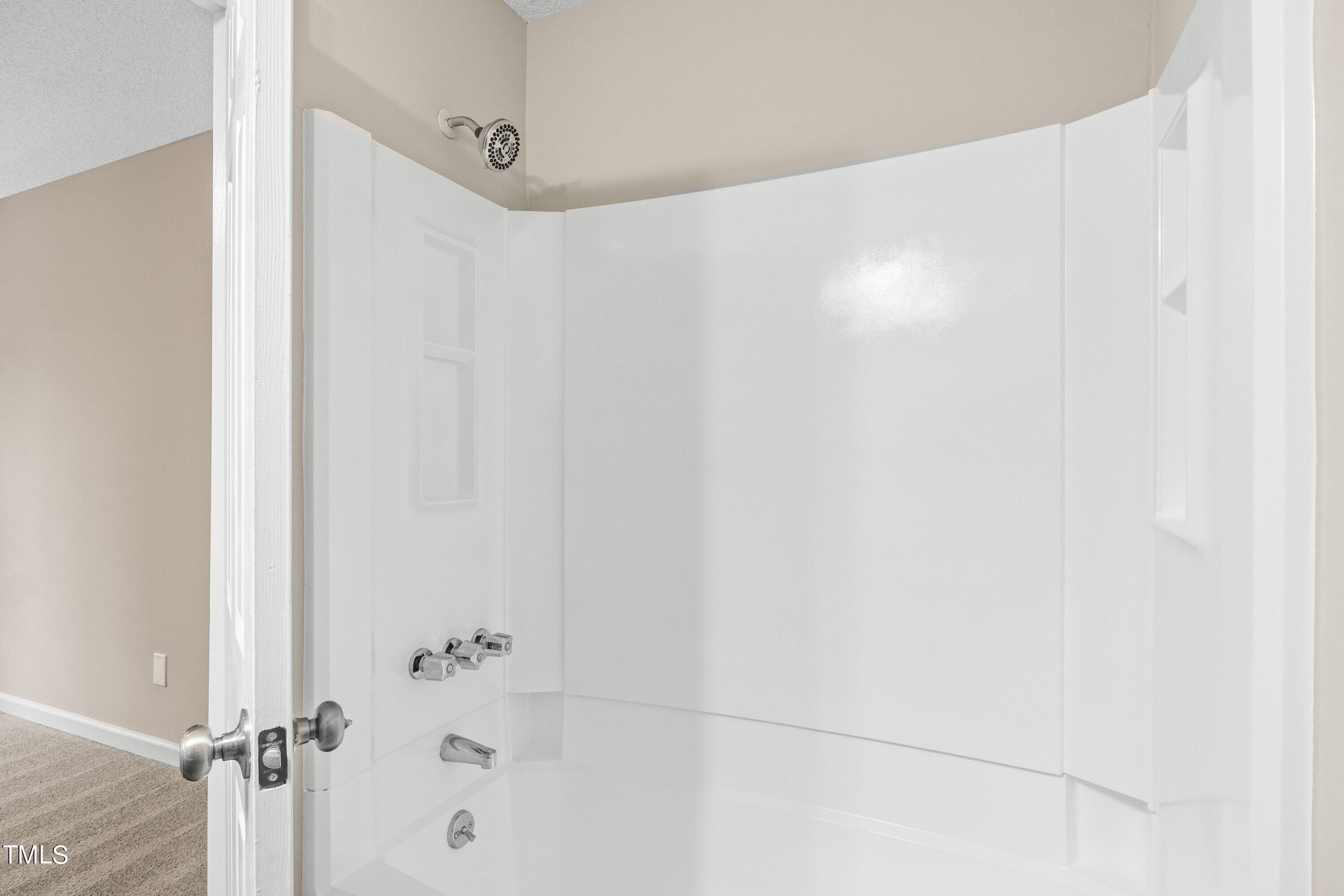 4440 Roller Court Raleigh, NC 27604 - Photo 33 of 38 a bathroom with a shower