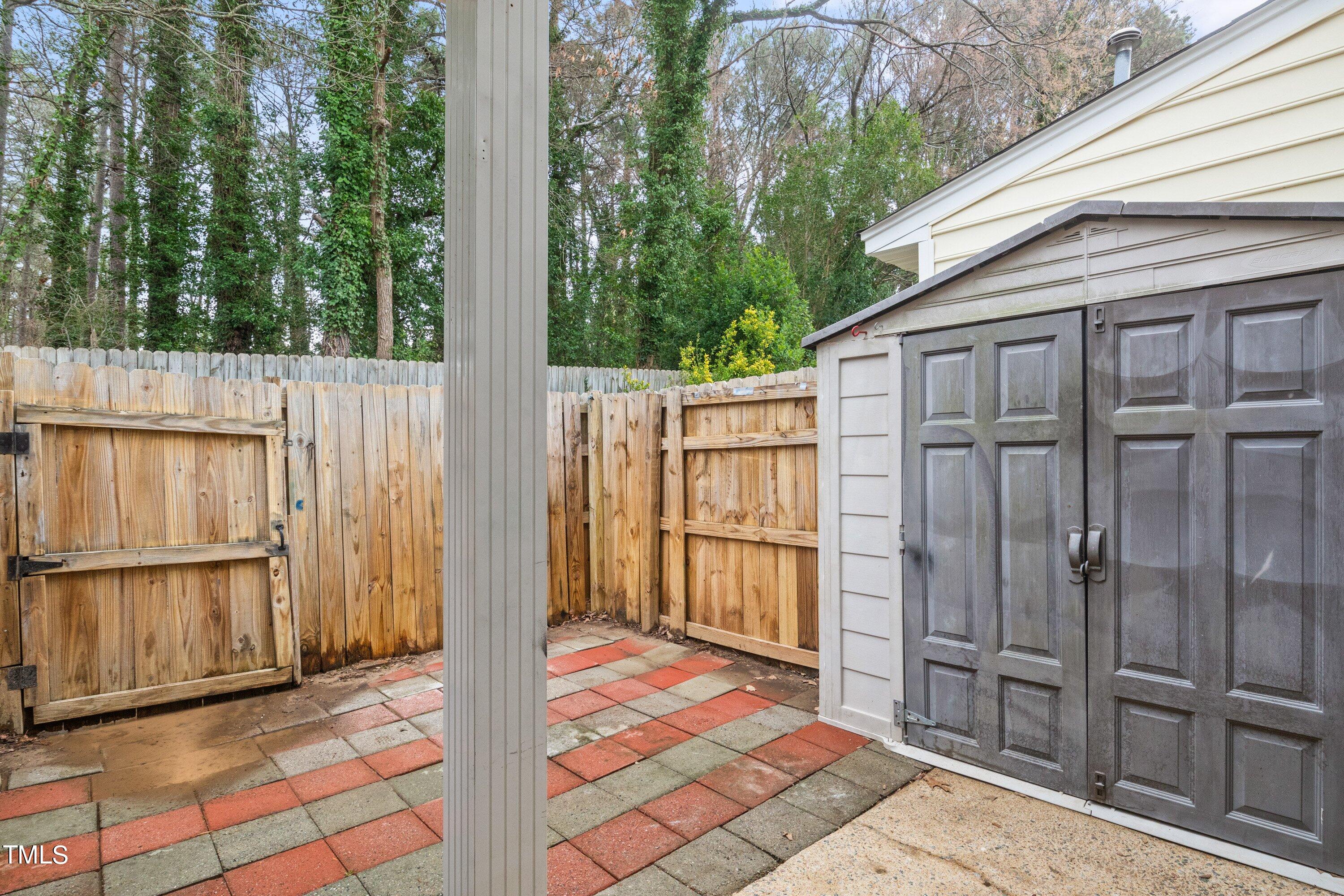 4440 Roller Court Raleigh, NC 27604 - Photo 35 of 38 a view of a backyard of a house
