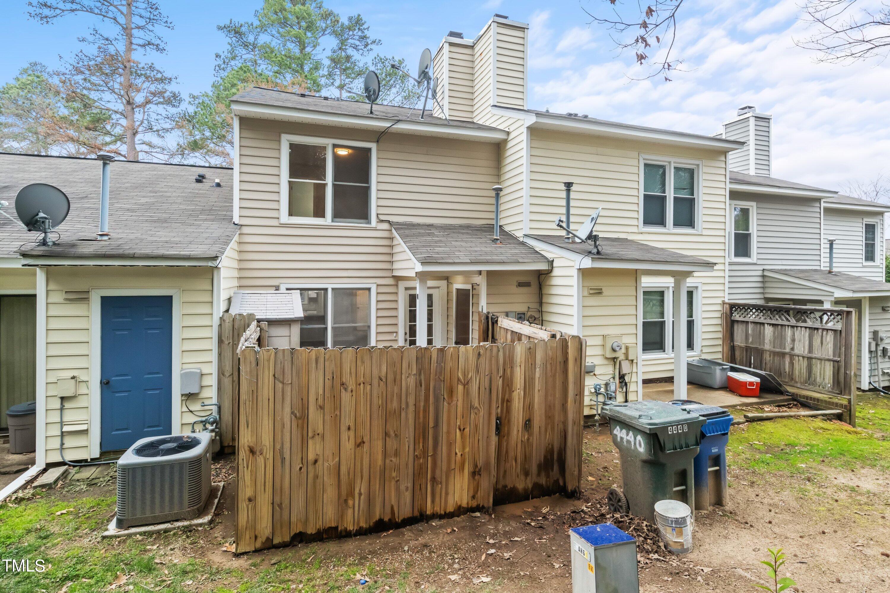 4440 Roller Court Raleigh, NC 27604 - Photo 37 of 38 a view of a house with backyard and sitting area
